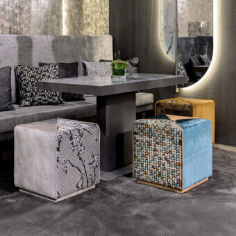 Exceptional Sicis Chamaleon square ottoman crafted with wood and upholstered in grayscale floral patterned fabric