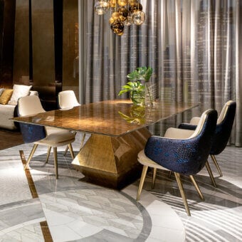 Distinguished Sicis Diamante table crafted from transparent glass with a warm golden-brown textured geometric base in Vetrite