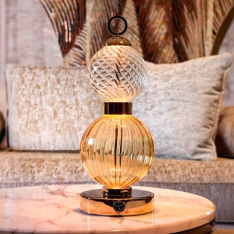 Exceptional Sicis Drop Battery Murano table lamp with warm amber ribbed glass and clear swirling glass in polished gold-toned metal