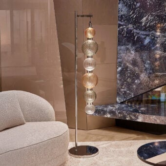 Captivating Sicis Drop floor lamp crafted in satin metal with delicately formed pyrex glass spheres in clear and amber tones
