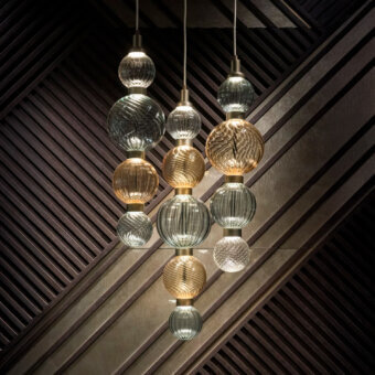 Exceptional Sicis Drop suspension lamp with cascading hand-blown Pyrex glass spheres and satin metal frames in clear, smoky gray, and amber hues