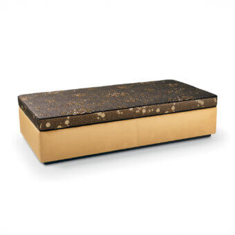 Distinguished Sicis Hector ottoman crafted in Italy with patterned dark brown and gold textile upholstery and satin-like finish