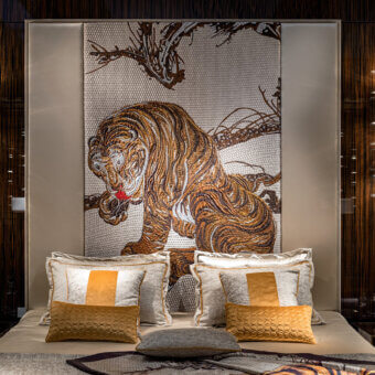 Exquisite Sicis Komo bed with artwork from the Jakuchu collection in ochre yellow, gray, and gold textiles with a dark glossy wood finish
