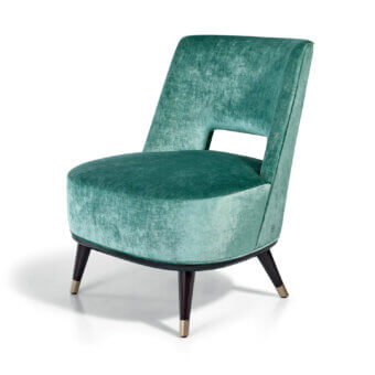 Refined Sicis Liam lounge chair with plush muted teal upholstery and lacquered elegantly tapered legs