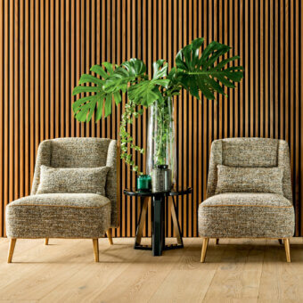 Distinguished Sicis Peggy lounge chair with textured neutral textile upholstery and gilded metal legs