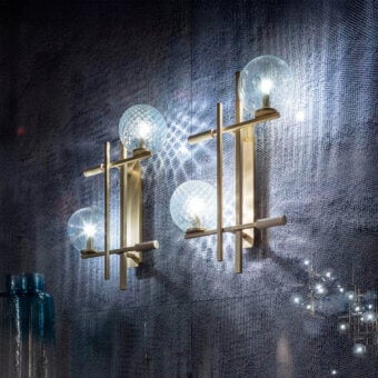 Distinguished Sicis Tris Murano wall lamp crafted in champagne metal with hand-blown Murano glass spheres and subtle blue accents