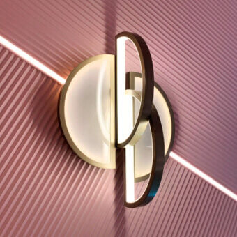 Superior Sicis Venus Wall Lamp crafted with champagne brass and luminous backlit Vetrite glass exhibiting curved angular forms
