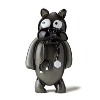 Murano glass dog sculpture, black opaque glass, rounded form with stethoscope; simplified, cartoonish design against white backdrop.
