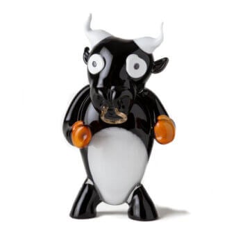 Murano glass bull figurine, black and white, glossy finish with amber accents, rounded form, clear glass eyes, Wave Murano Glass.