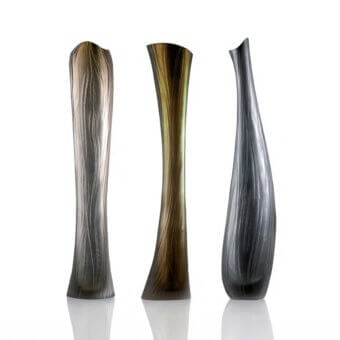 Murano glass vases, layered gray-beige, gold-amber, dark gray-silver, tall undulating forms with flared rims, translucent vertical striations.