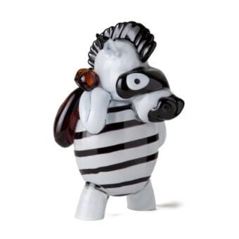 Murano glass zebra figurine, black and white stripes, rounded form with amber glass accent and swirling brown glass detail.