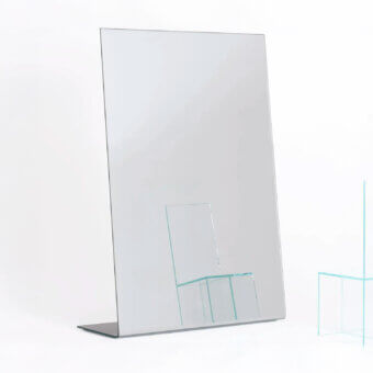 Distinguished Glas Italia I mirror built from curved extra-clear glass with silvered and silver-grey lacquered backing