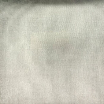 Pale off-white linen fabric sample displaying a tight, uniform grid weave with subtle tonal variations and a slightly rough texture.