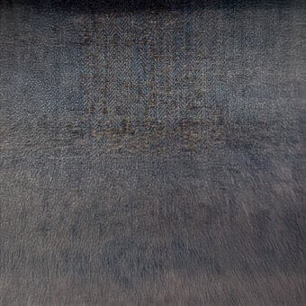 Dark gray textured surface with repeating light gray text pattern reading "cf1076 col." in blurred, overlapping arrangement.