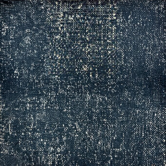 Dark teal woven textile with off-white speckled pattern, dense matte texture, and uniform surface displaying a slightly rough, artisanal appearance.