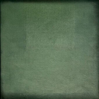 Dark green textured square sample with fine grain, subtle discoloration, and black border; labeled “cf1114 col. 140” for material reference.