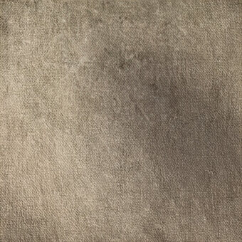 Beige and gray textured surface with a dense, short pile and mottled effect, displaying granular quality and diffused lighting.
