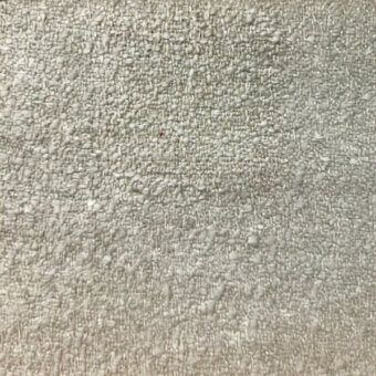 Pale gray looped fabric texture with a nubby, heathered surface and subtle yarn variations, displaying a tactile, three-dimensional quality.