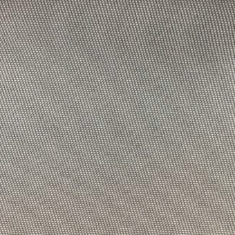 Woven fabric sample, muted gray tone, dense grid texture, consistent weave structure, subtle tonal variations, co1002 col. 102 label visible.