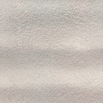 Light gray stippled texture with matte finish, displaying irregular bumps and tonal variations across a rough, tactile surface.