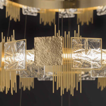 Distinguished Euroluce Character suspension lamp crafted in textured gold tone metal with translucent glass