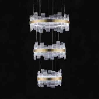 Exceptional Euroluce Focus suspension lamp crafted in Italy with clear glass elements and a sleek gold metallic band