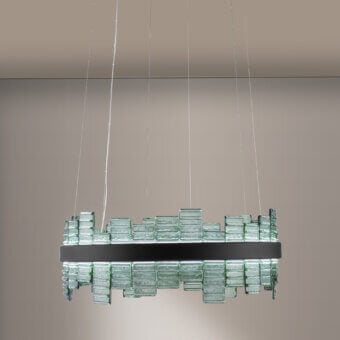 Elegant Euroluce Focus suspension lamp with pale green frosted glass blocks and dark-toned metal frame