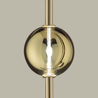 Exceptional Euroluce Mikado suspension lamp crafted in polished golden-toned metal with a luminous spherical glass enclosure