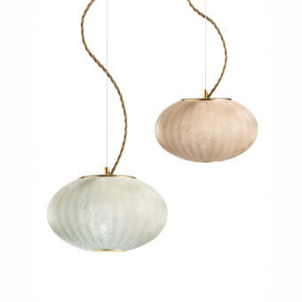 Moonlight suspension lamps, sage green and beige, spherical fluted shades with brass bands and twisted gold cords in staggered arrangement.