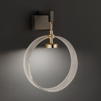 Cassoni Sospeso wall lamp, dark bronze and brass, with a square backplate and faceted clear glass shade.