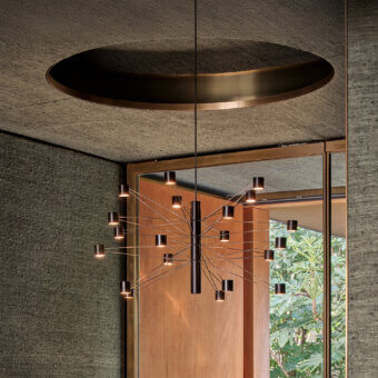 Innovative Kundalini Polar Suspension Lamp crafted in metal with a dark matte finish and radial arms