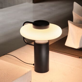 Exceptional Kundalini Tratto table lamp crafted in refined metal and opal glass with matte black finish