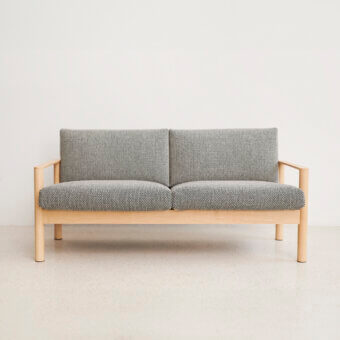 Superior Lapalma 10:30 sofa with muted gray textile upholstery and solid ash base crafted with a light finish