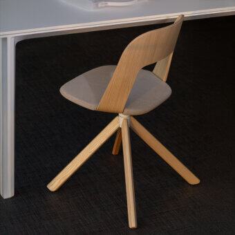 Distinguished Lapalma Arco chair with gray woven upholstery, curved plywood backrest and varnished solid wood base with satin finish
