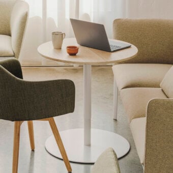 Exceptional Lapalma Brio Bistrot table crafted with a natural wood tabletop and matte white powder-coated base in a linen fabric pattern