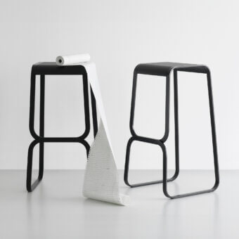 Distinguished Lapalma Continuum stool with impressively sculpted bent metal and smooth matte black finish