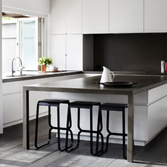 Superior Lapalma Continuum stool with sculpted bent metal exhibiting a matte black finish and angular form