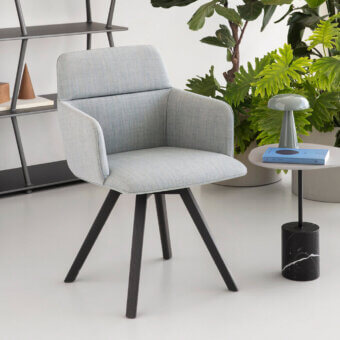 Superior Lapalma Foil armchair upholstered in light gray textured textile with a dark finished solid ash wood base