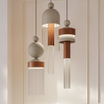 Elegant Masiero Nappe XL-XM suspension lamp with a neutral beige shade and warm brown glossy disc detail crafted in painted metal