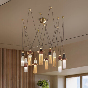 Nappe suspension lamp, gold and beige, fifteen frosted glass pendants with cascading gold rods from a circular hub.