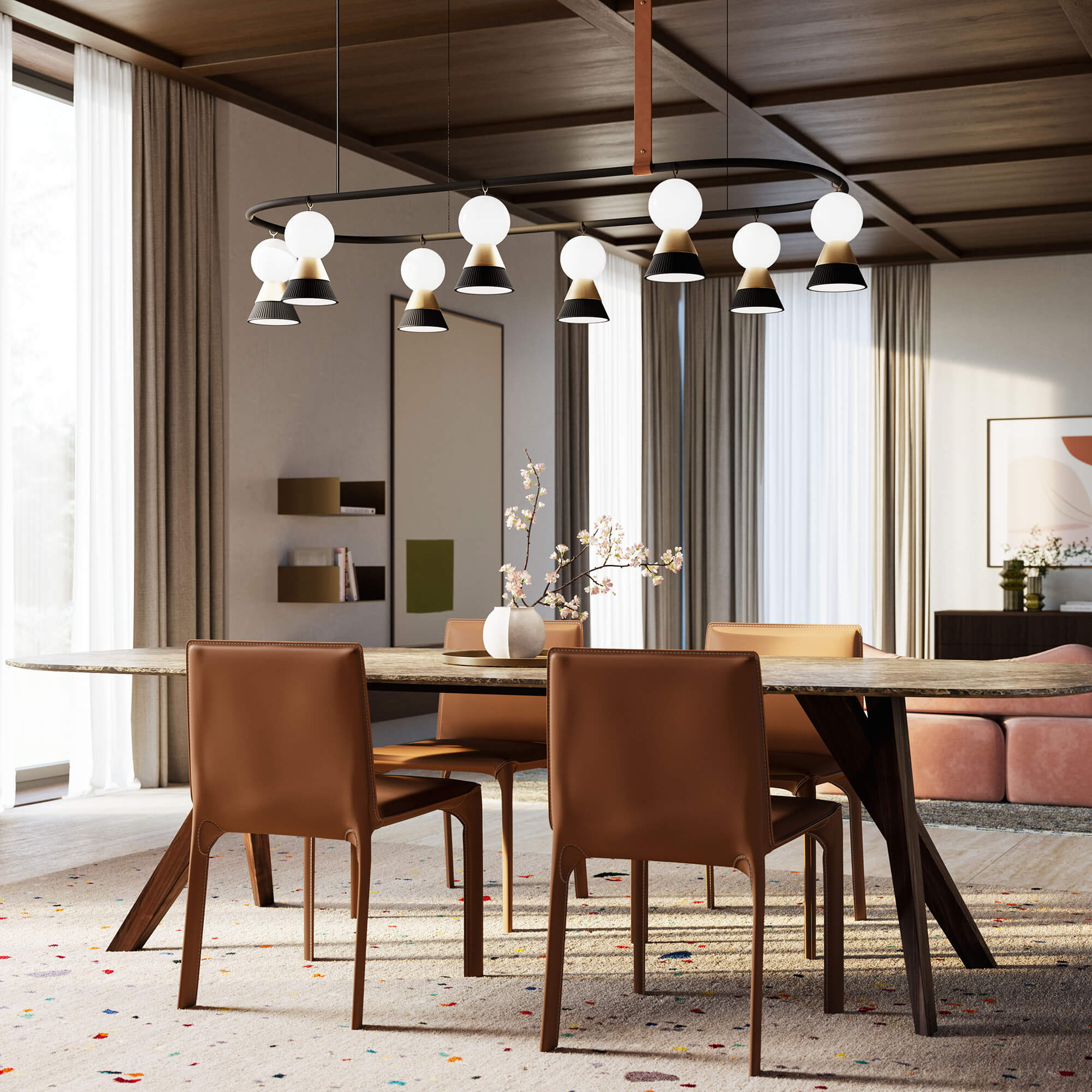 Dining room with wood table, eight leather chairs, linear chandelier, beige curtains, mirror, and patterned rug; Cassoni 2025 collection.