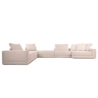 Distinguished Verzelloni Lands sectional with pale blush textile upholstery and concealed black lacquered beech wood feet