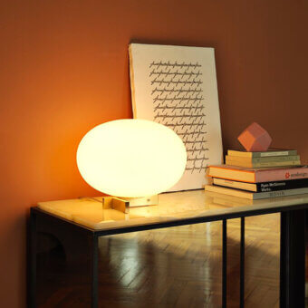 Superior Oluce Alba table lamp with opaque glass shade and polished gold rectangular base