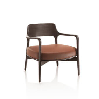 Lounge chair, dark brown wood frame, tan leather upholstery, curved backrest, tapered legs, modern design, studio shot, white background.