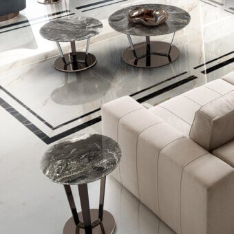 Superior DV Home Collection Soho coffee table with radiant onyx top and shining stainless steel base