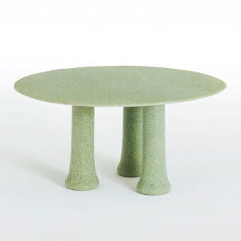 Distinctive Glas Italia Babar table crafted in recycled glass grit and glass shards with advanced polymers and a matte pastel jade finish
