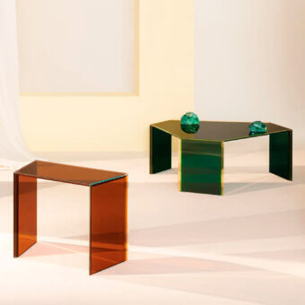 Glas Italia Bisel coffee tables, emerald green & amber, hexagonal glass tops with beveled acrylic legs, studio shot.