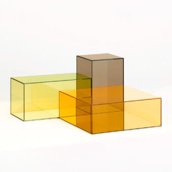 Distinguished Glas Italia Donald table crafted in laminated glass with amber gradient and mirrored stainless steel base