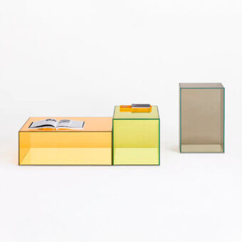 Superior Glas Italia Donald table crafted in orange laminated glass with glossy bonded construction and mirrored stainless steel base