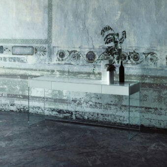 Distinguished Glas Italia Float console with transparent extralight glass sides and wengé wood drawers clad in glossy lacquered white tempered glass
